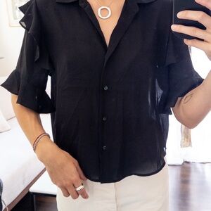 Black Sheer Ruffle Sleeve Blouse from the Kooples